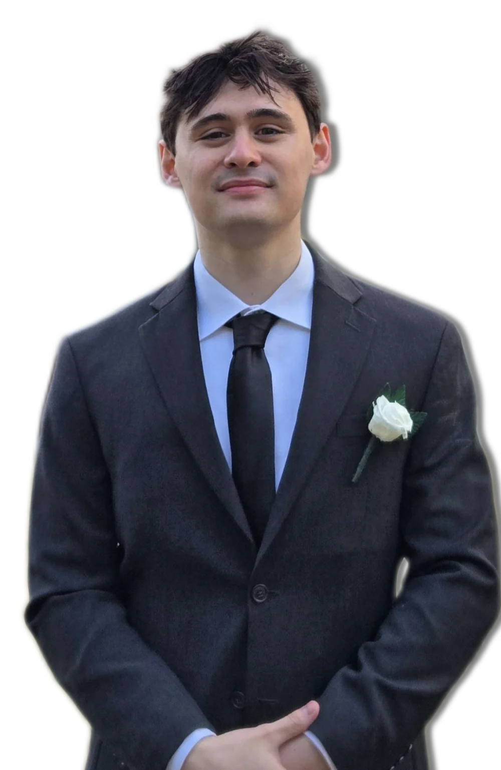 Travis Heavener in a black tux and tie
